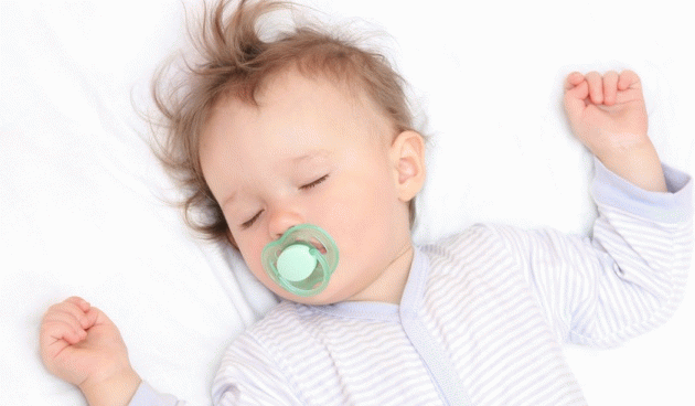 why does the child startle in his sleep