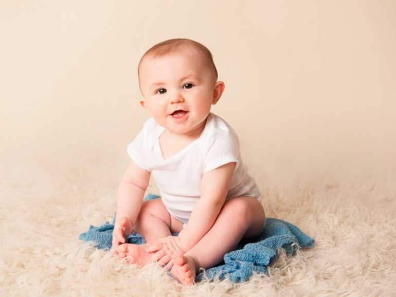 when the baby begins to sit