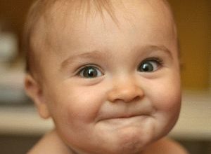 When the baby begins to smile