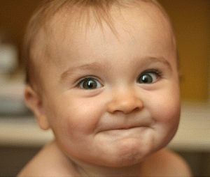 When the baby begins to smile