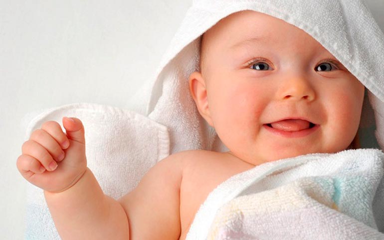 newborn smiling