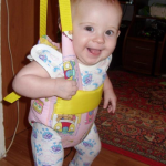 Toddler in ordinary hanging jumpers