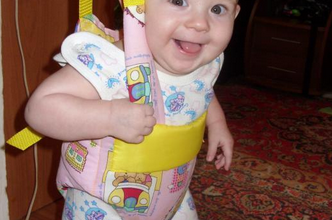 Toddler in ordinary hanging jumpers