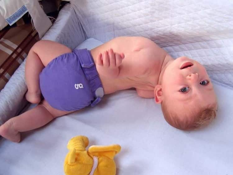 teach a child to roll from back to stomach