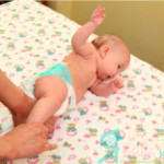 the child rolled over on its side