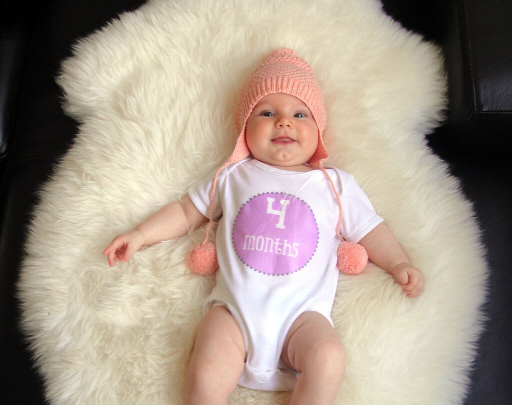 What should a child be able to do at 2 months