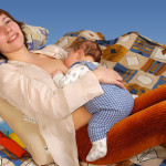 Baby feeding position on mom