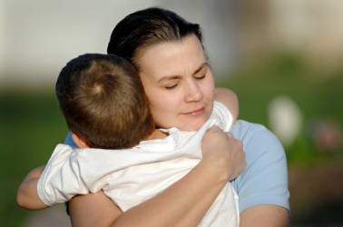 mom hugs baby