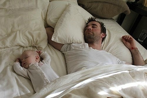 young dad with baby