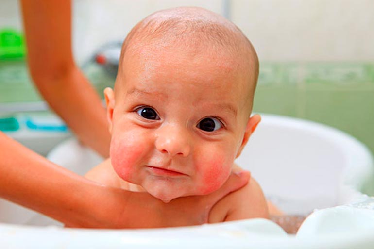 bathing newborn