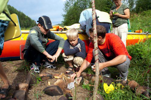 with a child on a camping trip