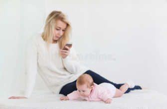 mom is sitting on the phone
