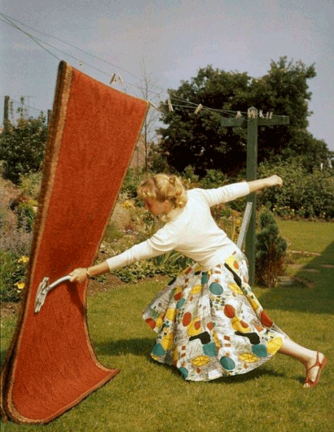 pregnant woman knocks a carpet