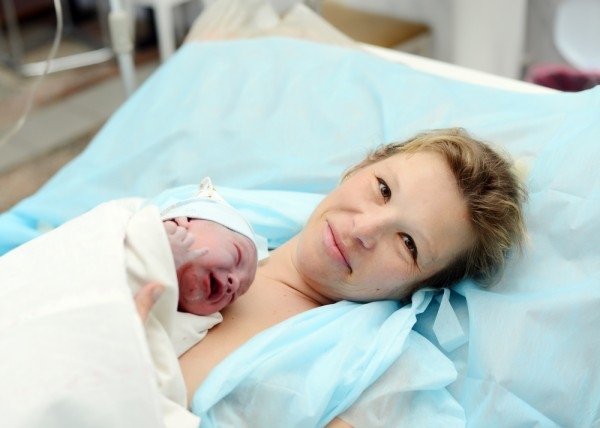 newborn on mom’s stomach