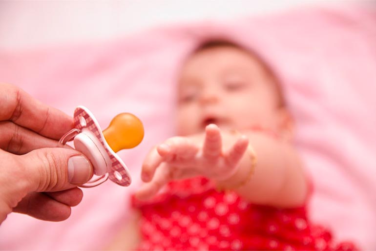how to wean a baby from a dummy