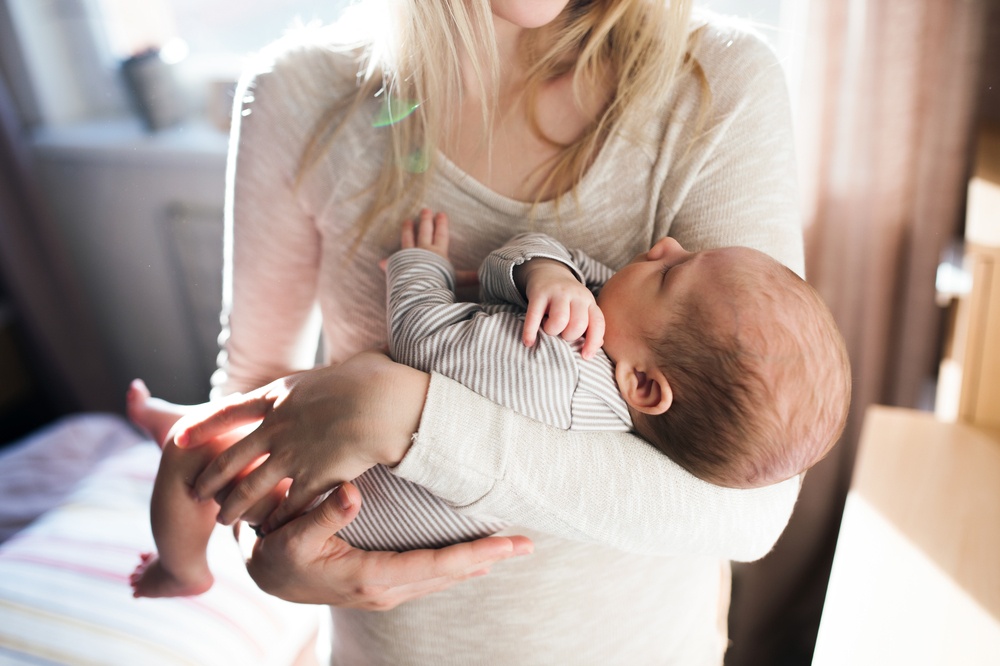 mom doesn’t let anyone take her child in her arms