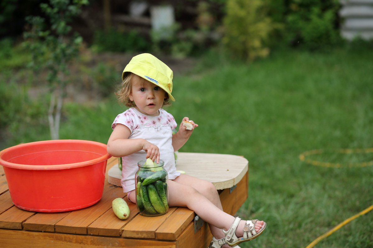 child rest in the country in summer