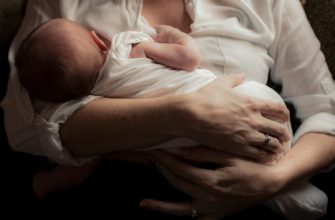 mother feeds the baby breast