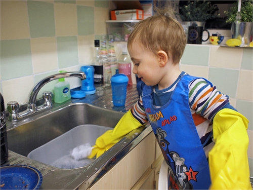 child helps around the house