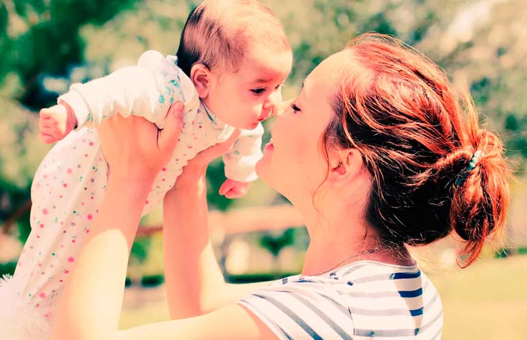 mom with a baby in her arms