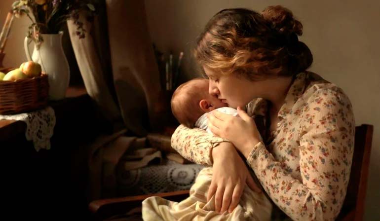mom lulls the baby