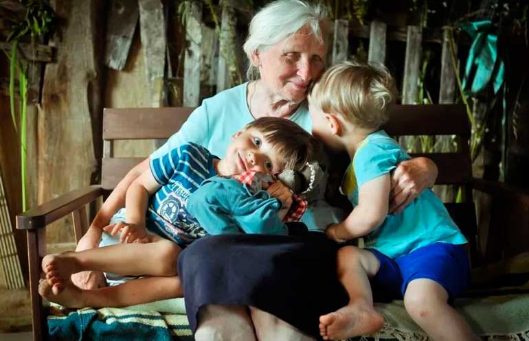 happy grandmother with grandchildren