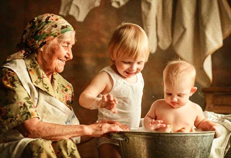 happy grandmother with grandchildren